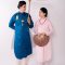Traditional Vietnamese costumes - The bride and groom in their sleeveless Ao Dai